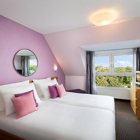 Hotel Uhu Garni Кёльн Экстерьер фото