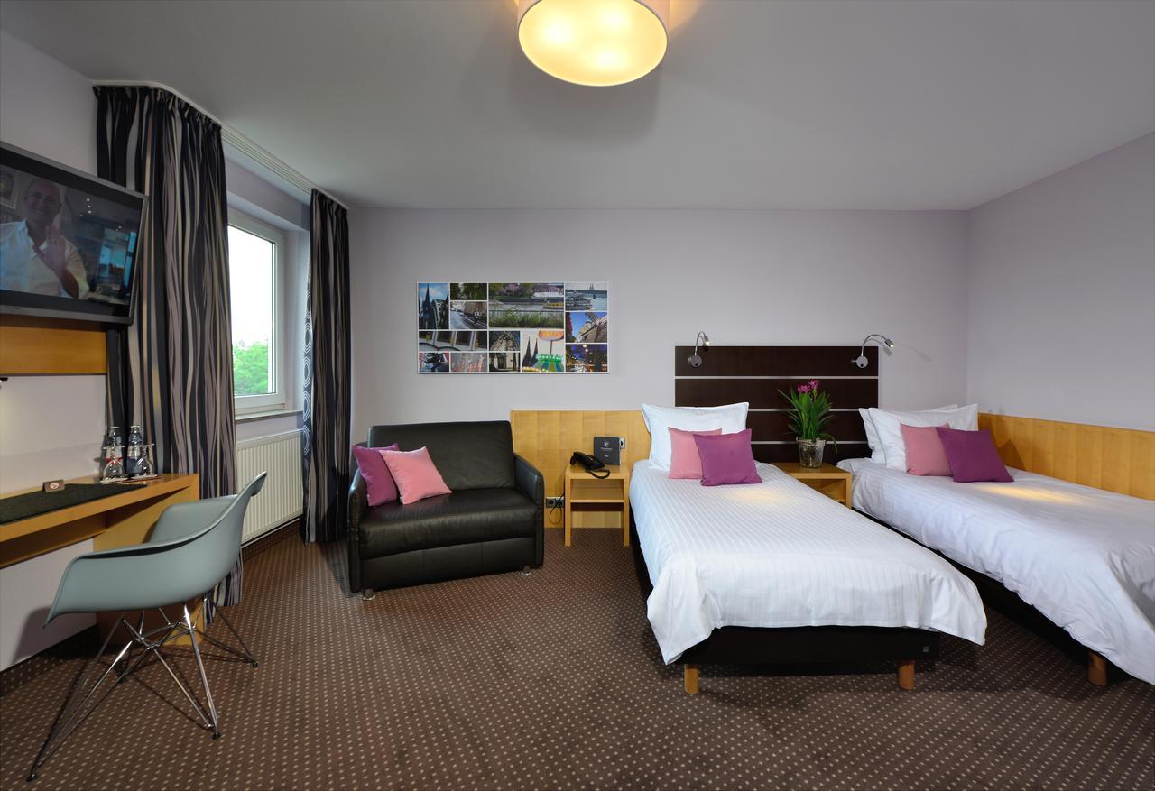 Hotel Uhu Garni Кёльн Экстерьер фото