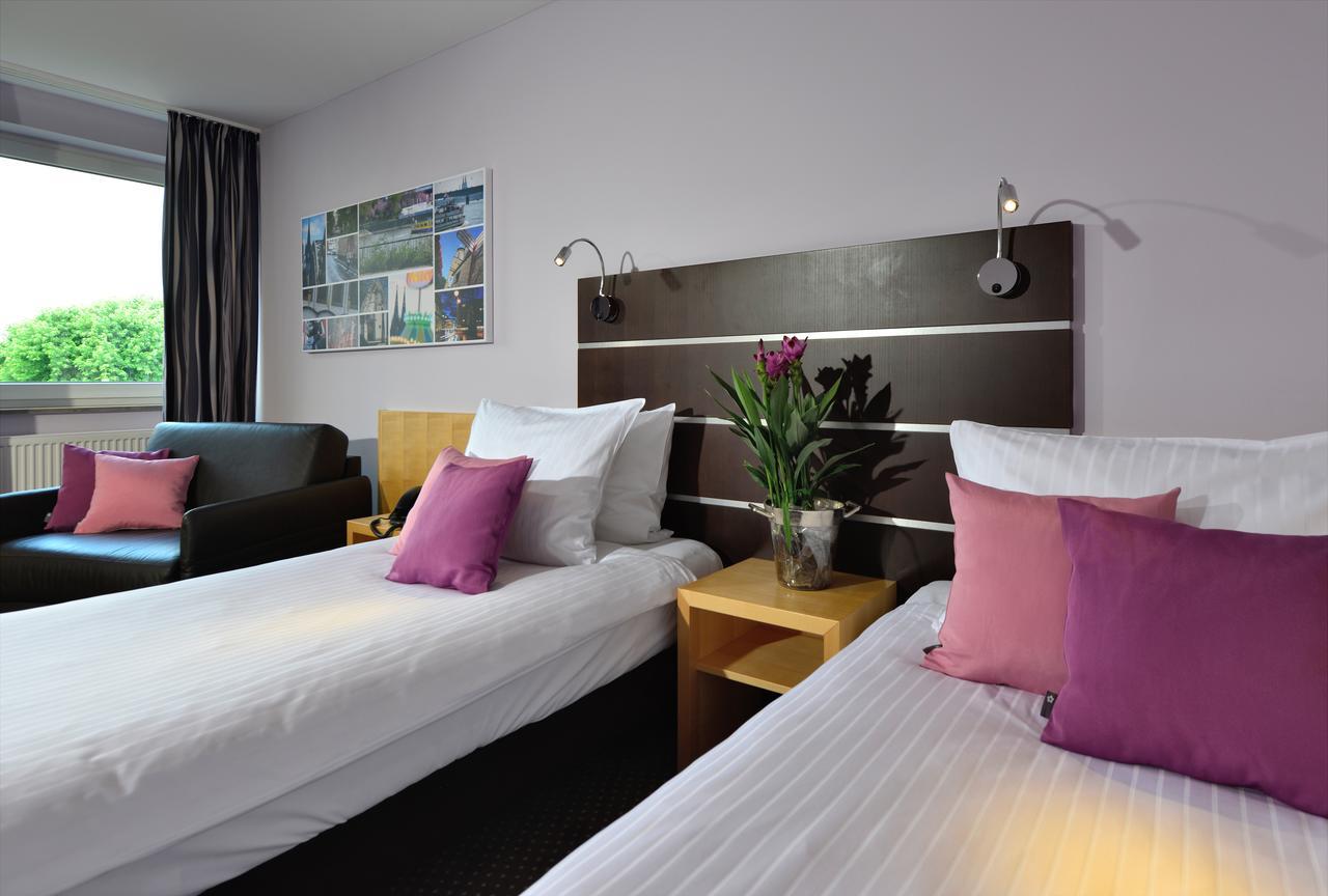 Hotel Uhu Garni Кёльн Экстерьер фото