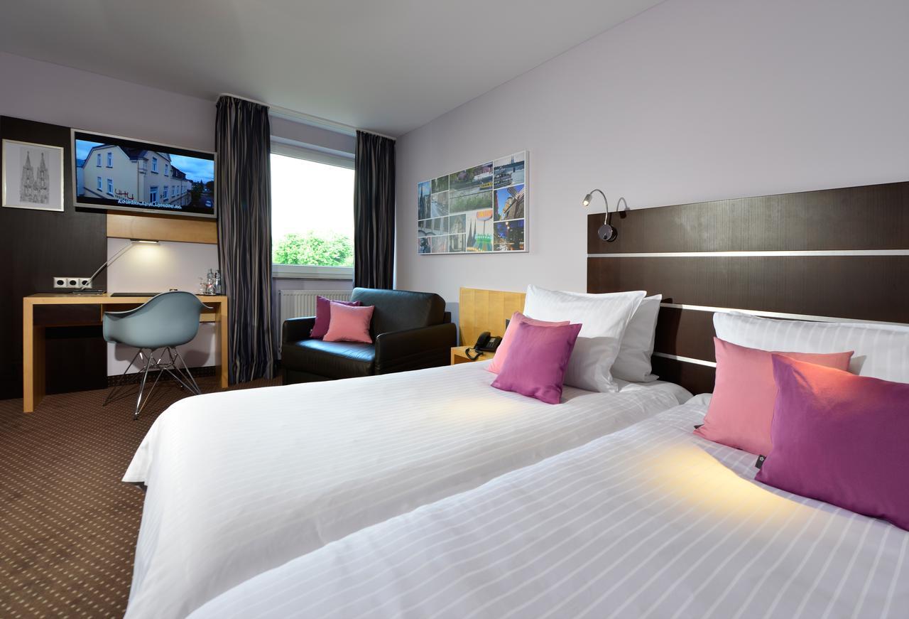 Hotel Uhu Garni Кёльн Экстерьер фото